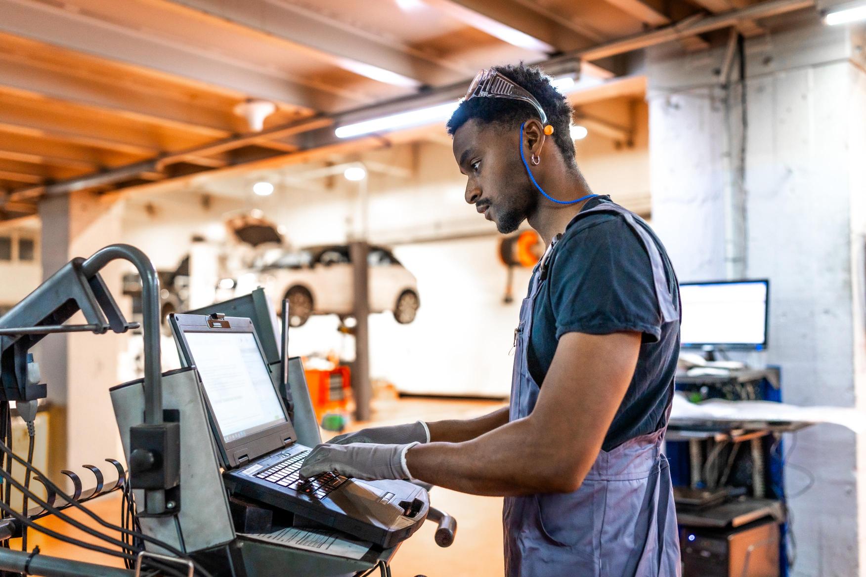 car-mechanic-performing-diagnostic-test-using-lapt-2025-05-13-05-46-57-utc (1)